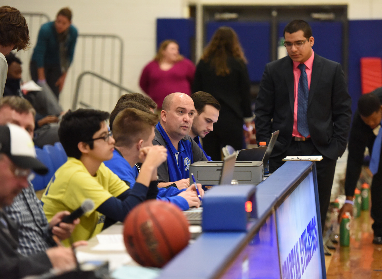 Kipley on press row at Aurora University.